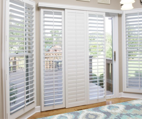 Sliding door shutters leading to patio